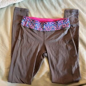 Lululemon Iviva leggings size 10. Multi Color Waist Band With Zipper Pocket